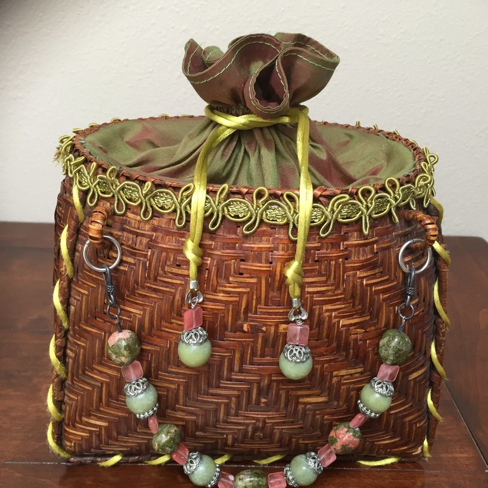 Bucket bag, woven wicker with silk lining.